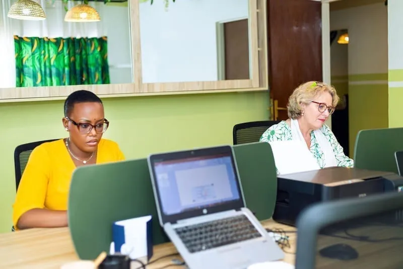 Modern co-working space with desks and comfortable seating